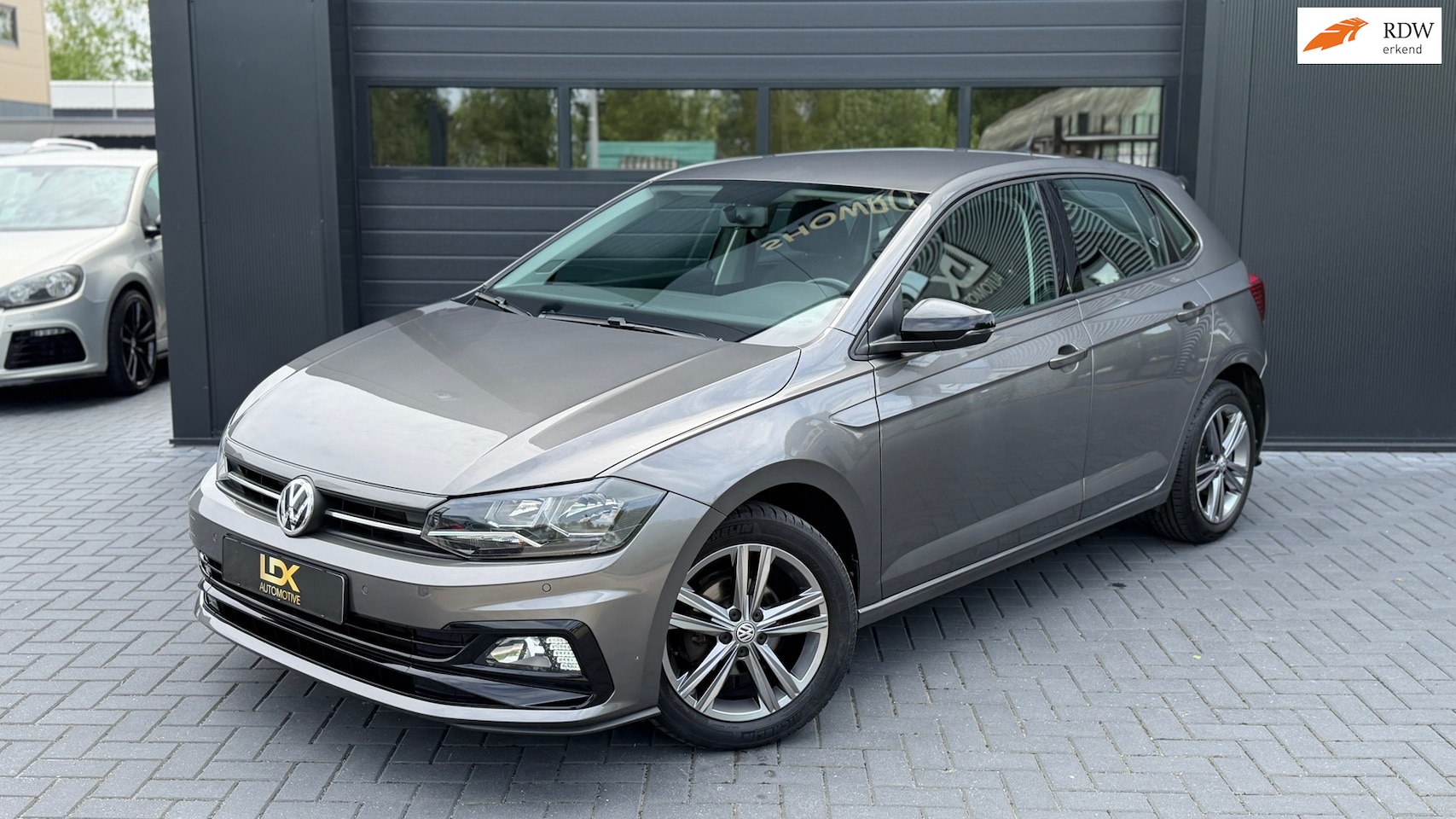 Volkswagen Polo - 1.0 TSI Comfortline R-Line|Airco|PDC - AutoWereld.nl