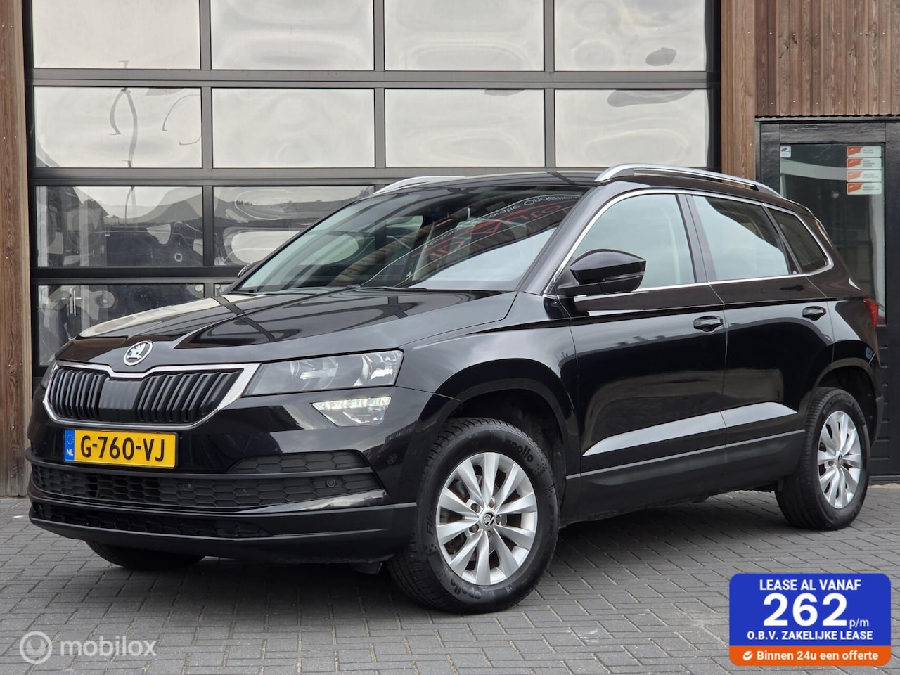 Skoda Karoq - 1.6 TDI DSG CRUISE CARPLAY NAVI TREKHAAK STOELVERWARMING - AutoWereld.nl