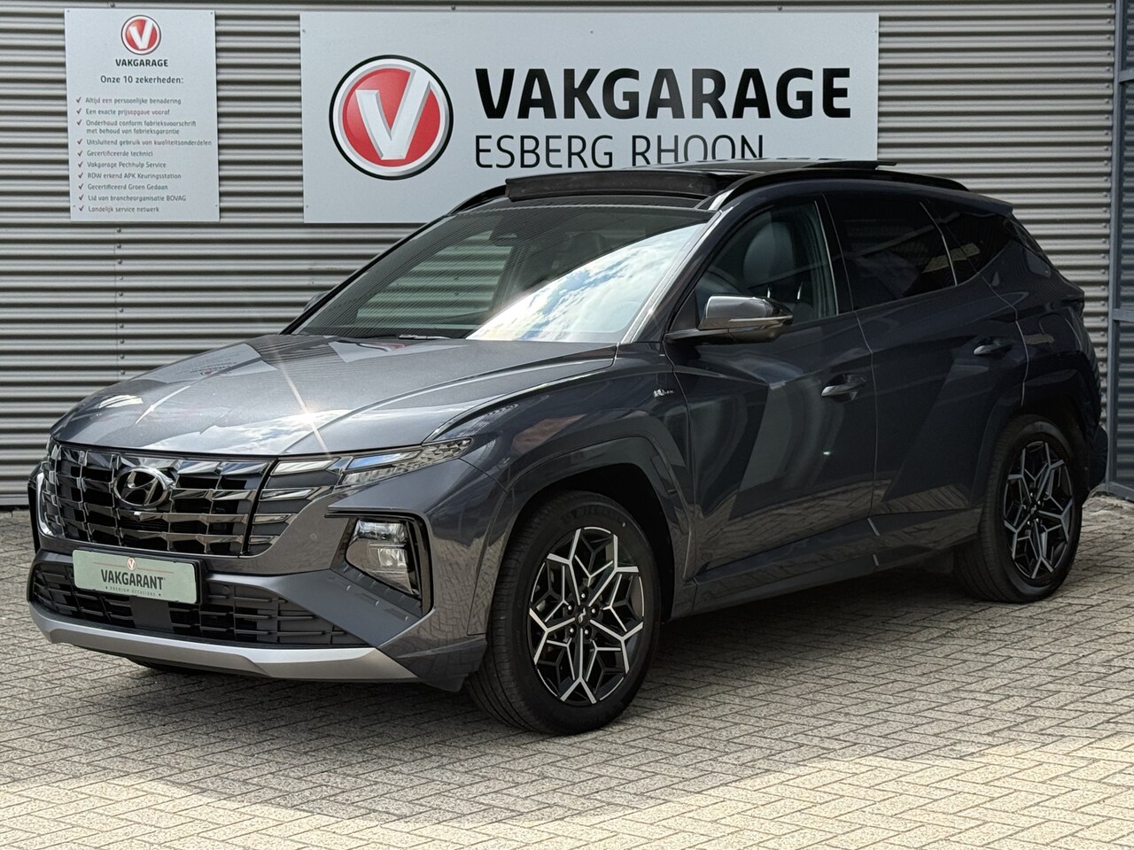 Hyundai Tucson - 1.6 T-GDI PHEV N Line Sky 4WD NAVI/CAM,SCHUIFDAK,MEM.STOELEN - AutoWereld.nl