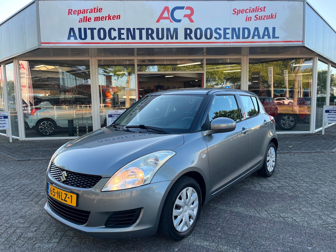 Suzuki Swift - 1.2 Comfort AIRCO/ cruisecontrol /stoelverwarming 5 Deurs - AutoWereld.nl