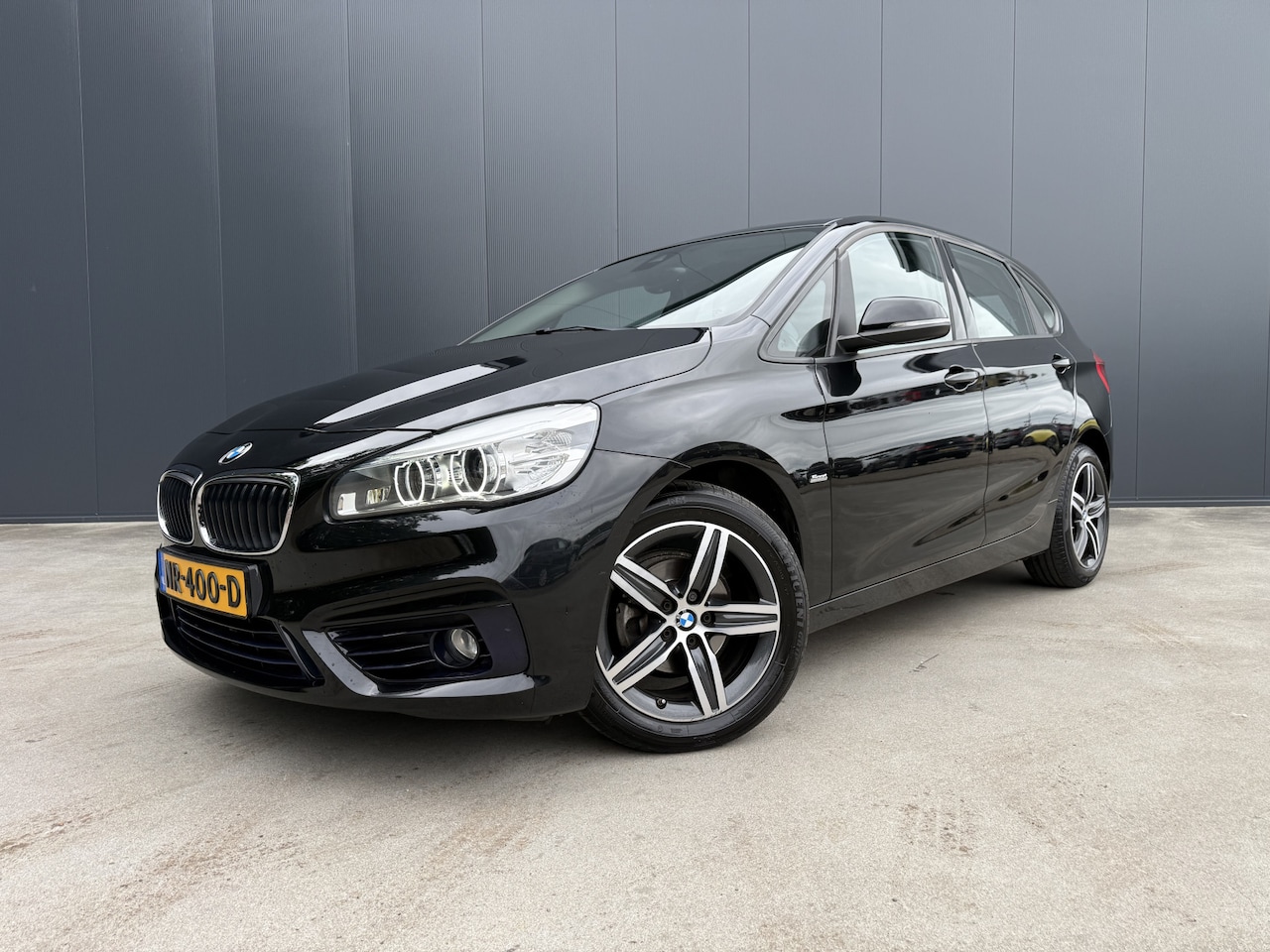 BMW 2-serie Active Tourer - 216i Executive NAVI CRUISE ECC TREKHAAK - AutoWereld.nl