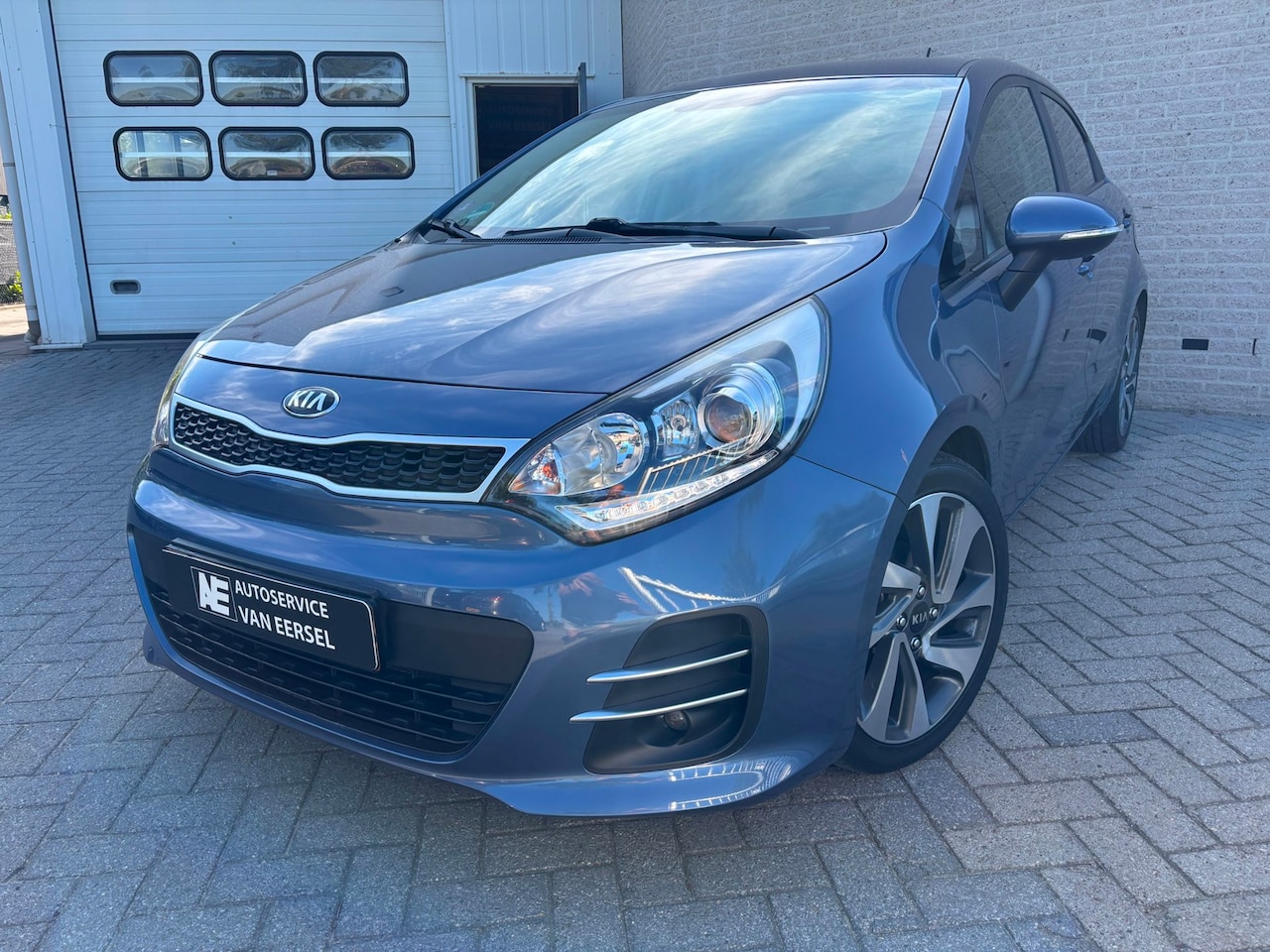Kia Rio - 1.2 CVVT ExecutiveLine trek.afnb/pdc/a.uitr.cam./navi. - AutoWereld.nl
