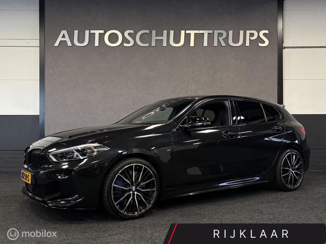 BMW 1-serie - M135i xDrive High Executive Edition M SPORT / SCHUIFDAK / VOL LEDER / PANO / HARMAN & KARD - AutoWereld.nl