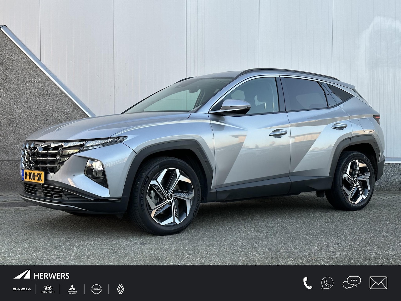 Hyundai Tucson - 1.6 T-GDI HEV Comfort / Navigatie / Camera / Parkeersensoren v + a / Climate Control / 19 - AutoWereld.nl