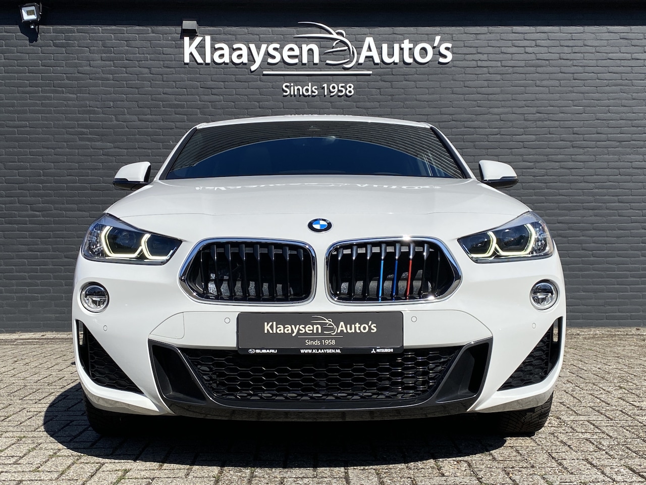 BMW X2 - sDrive18i High Executive M-Sport | dealer onderh. | leer/stof interieur | panoramadak | na - AutoWereld.nl
