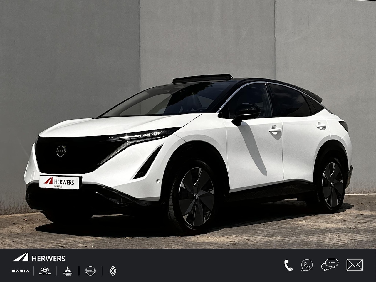 Nissan Ariya - Evolve 91 kWh / Dealer onderhouden / 99% SoH / Panorama schuifdak / HUD / Navigatie / App - AutoWereld.nl