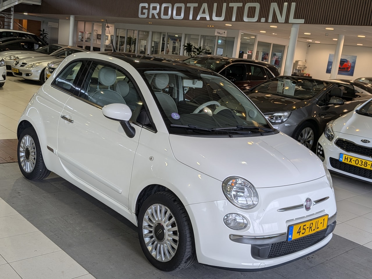 Fiat 500 - 1.2 Lounge Panoramadak, Airco, Stuurbekrachtiging - AutoWereld.nl