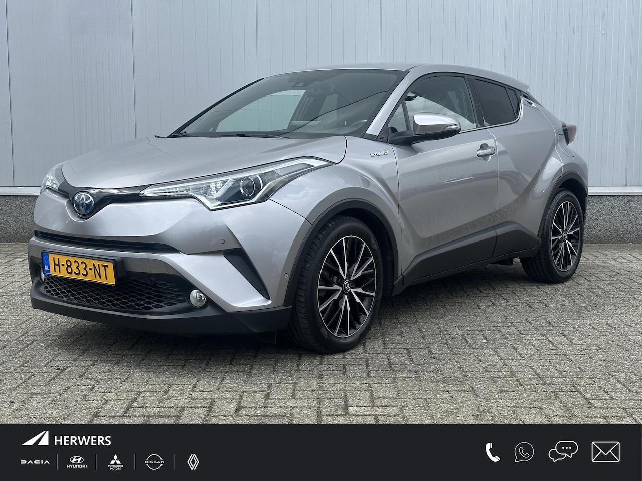Toyota C-HR - 1.8 Hybrid Executive / Navigatie / Adaptieve Cruise control / Achteruitrijcamera / Stoelve - AutoWereld.nl