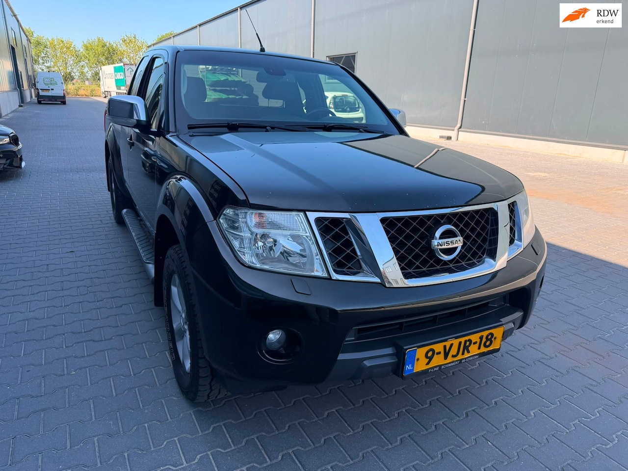 Nissan Navara - 2.5 dCi LE King Cab 2.5 dCi LE King Cab - AutoWereld.nl