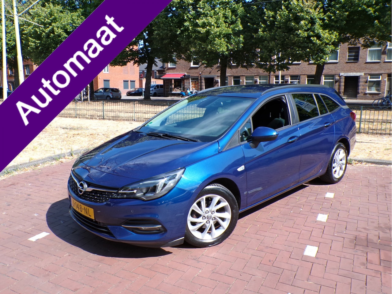 Opel Astra Sports Tourer - 1.4 Business Edition 1E EIGENAAR..... AUTOMAAT APPLE CARP CRUISECONT TEL NAV..... - AutoWereld.nl