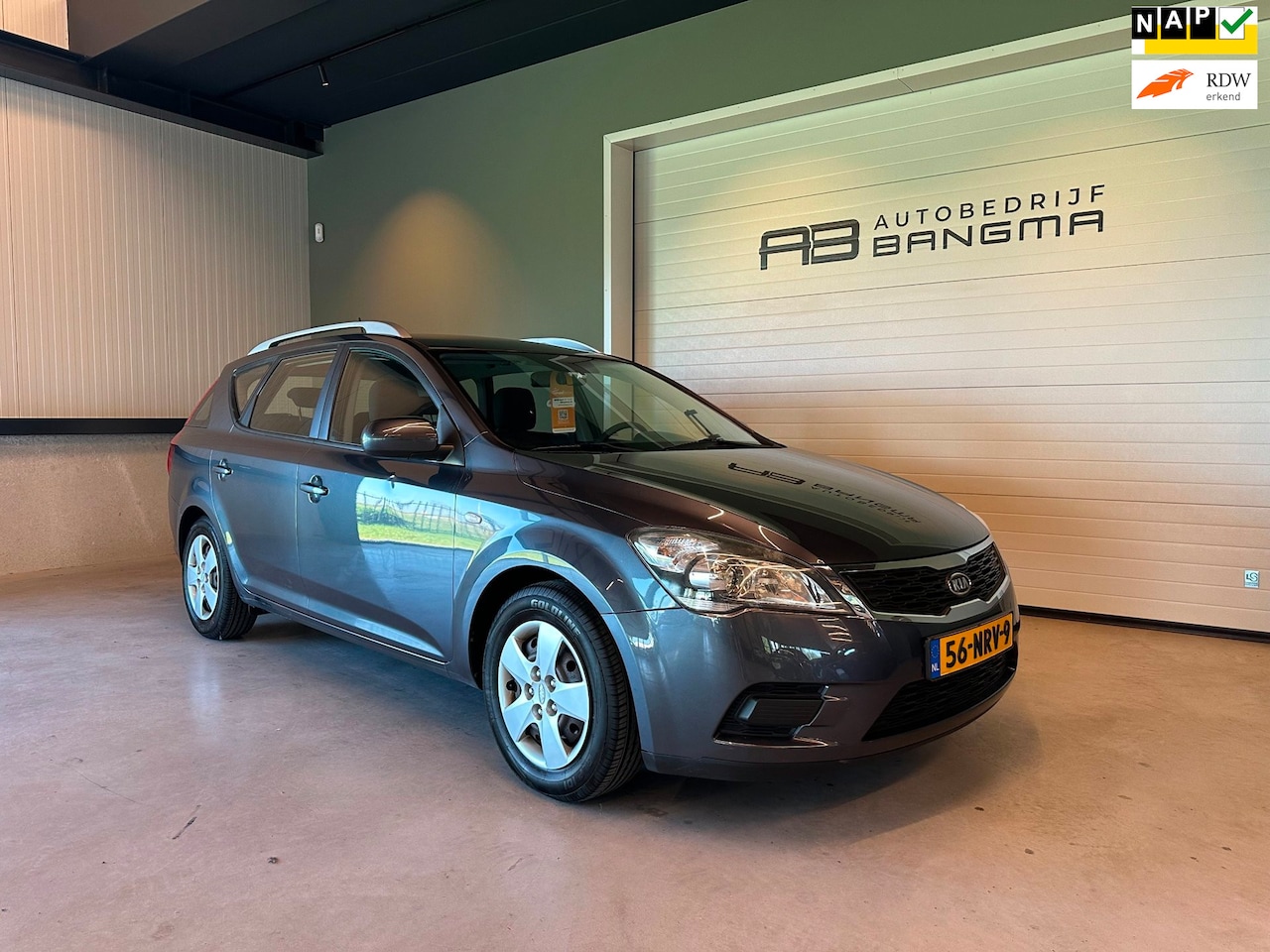 Kia Cee'd - 1.4 CVVT X-tra-uitv|AIRCO|TREKHAAK|ISOFIX|PARKEERSENSOREN|AUX+Ipod+USB|DAKRAILS|NIEUWE APK - AutoWereld.nl