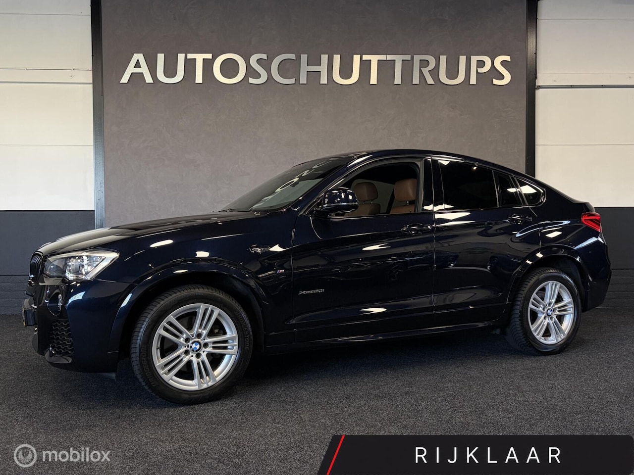 BMW X4 - xDrive20i High Executive M SPORT CARBONSCHWARZ / LEDER / NAVI / PDC / STOELVERW. / NAP / - AutoWereld.nl