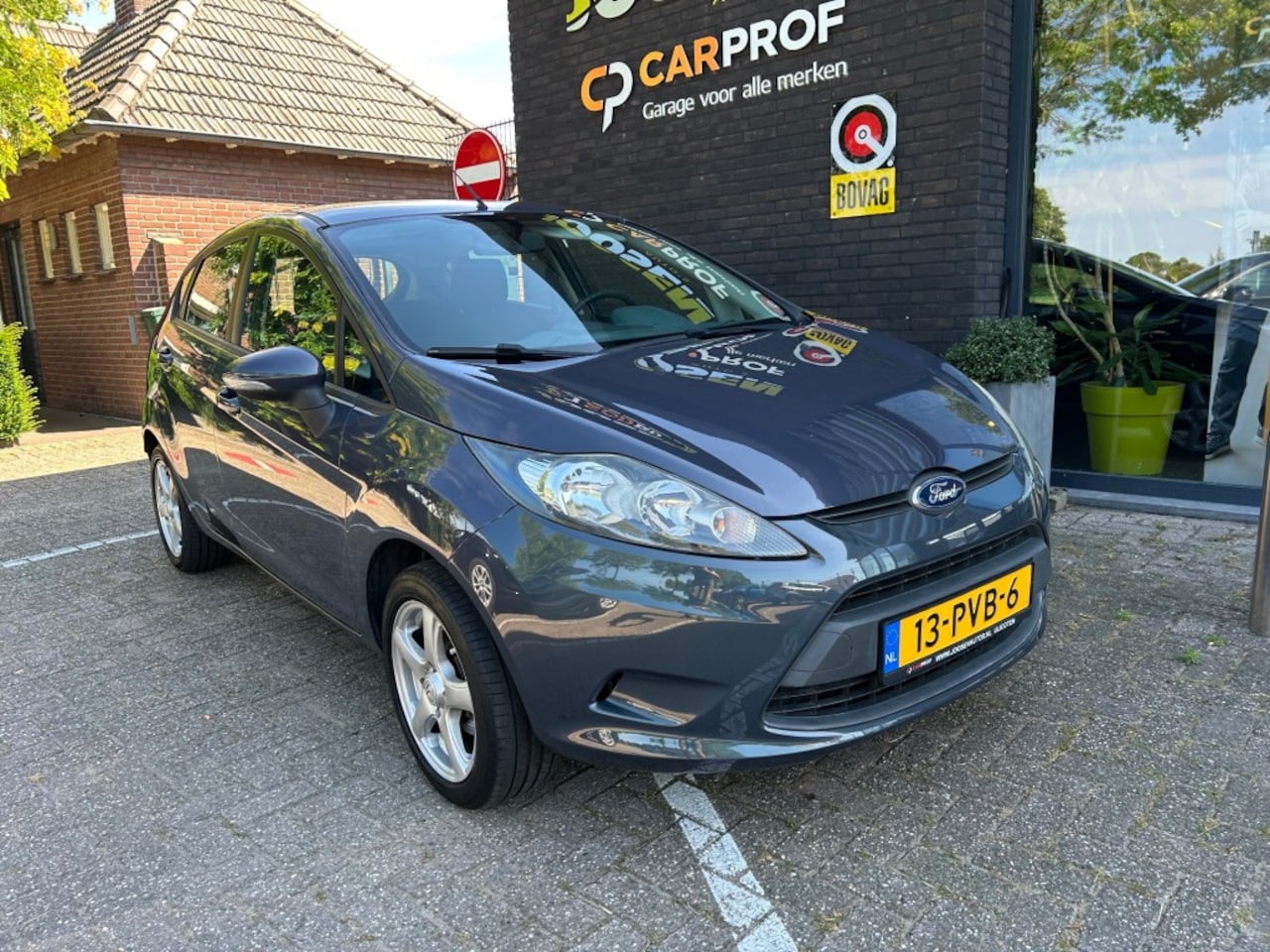 Ford Fiesta - 1.25 Ghia 1.25 GHIA - AutoWereld.nl
