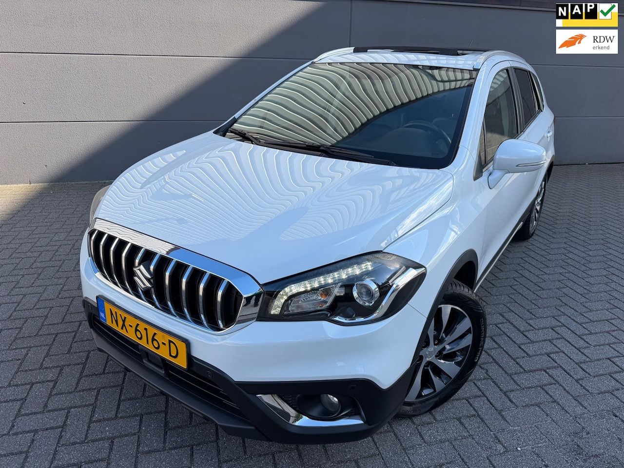 Suzuki S-Cross - 1.0 Boosterjet High Executive*1eEigenaar*OpenDak*Camera*Trekhaak*NAVI*APK*NAP - AutoWereld.nl