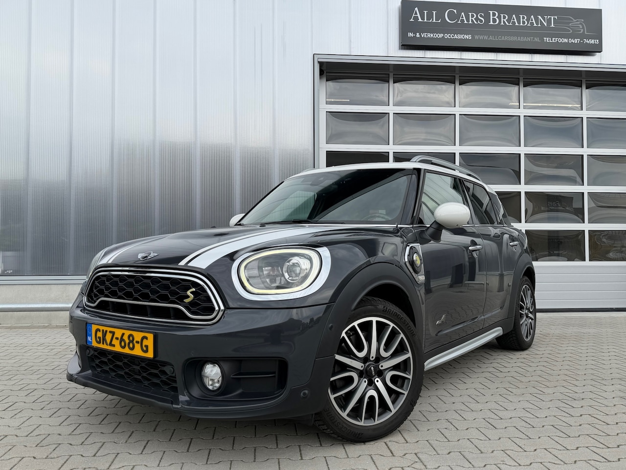MINI Countryman - 1.5 Cooper S E ALL4 Pepper / leder / xenon / navi - AutoWereld.nl