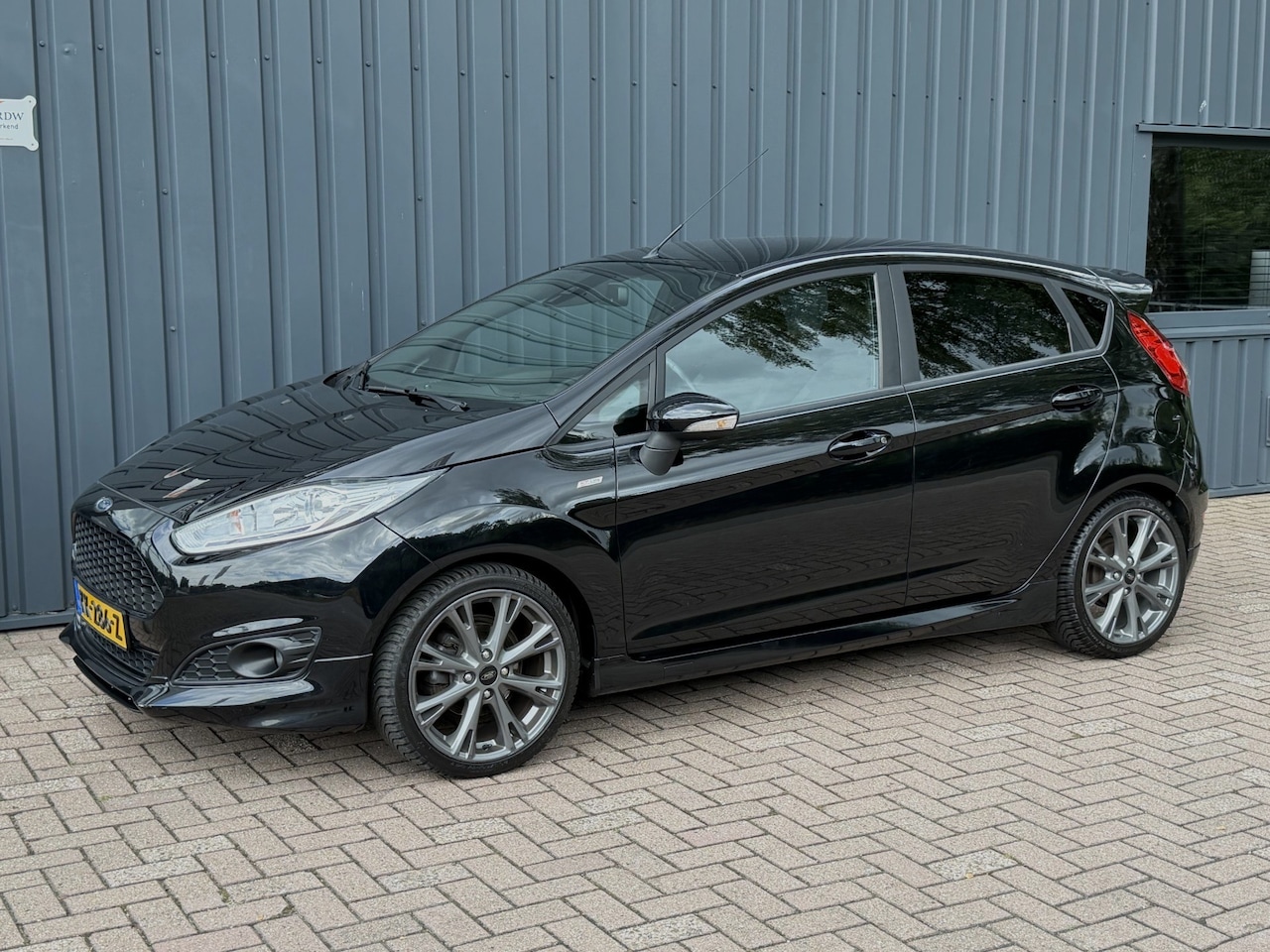 Ford Fiesta - 1.0 EcoBoost ST Line NL AUTO!/NAP!/NAVI!/ONDERHOUDEN!/ - AutoWereld.nl