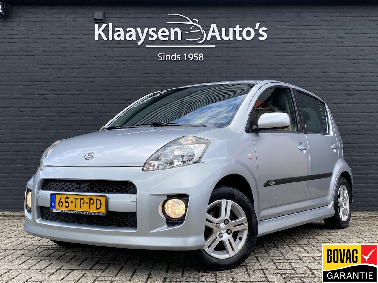 Daihatsu Sirion 2 - 1.3-16V Sport | dealer onderhouden | airco | lichtmetalen velgen | spoiler | elektrische r - AutoWereld.nl