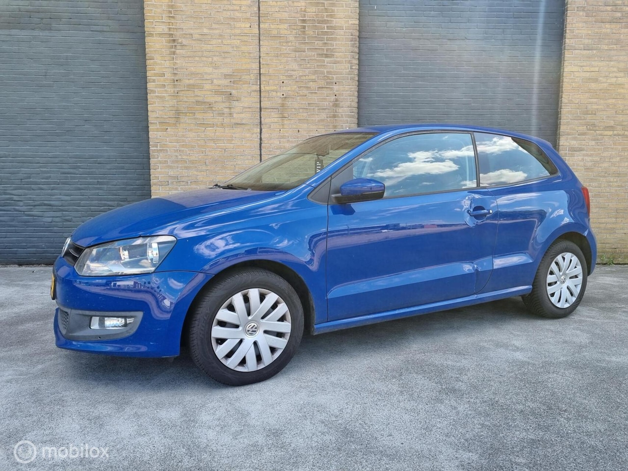 Volkswagen Polo - 1.2 cruise airco stoelverwarming - AutoWereld.nl