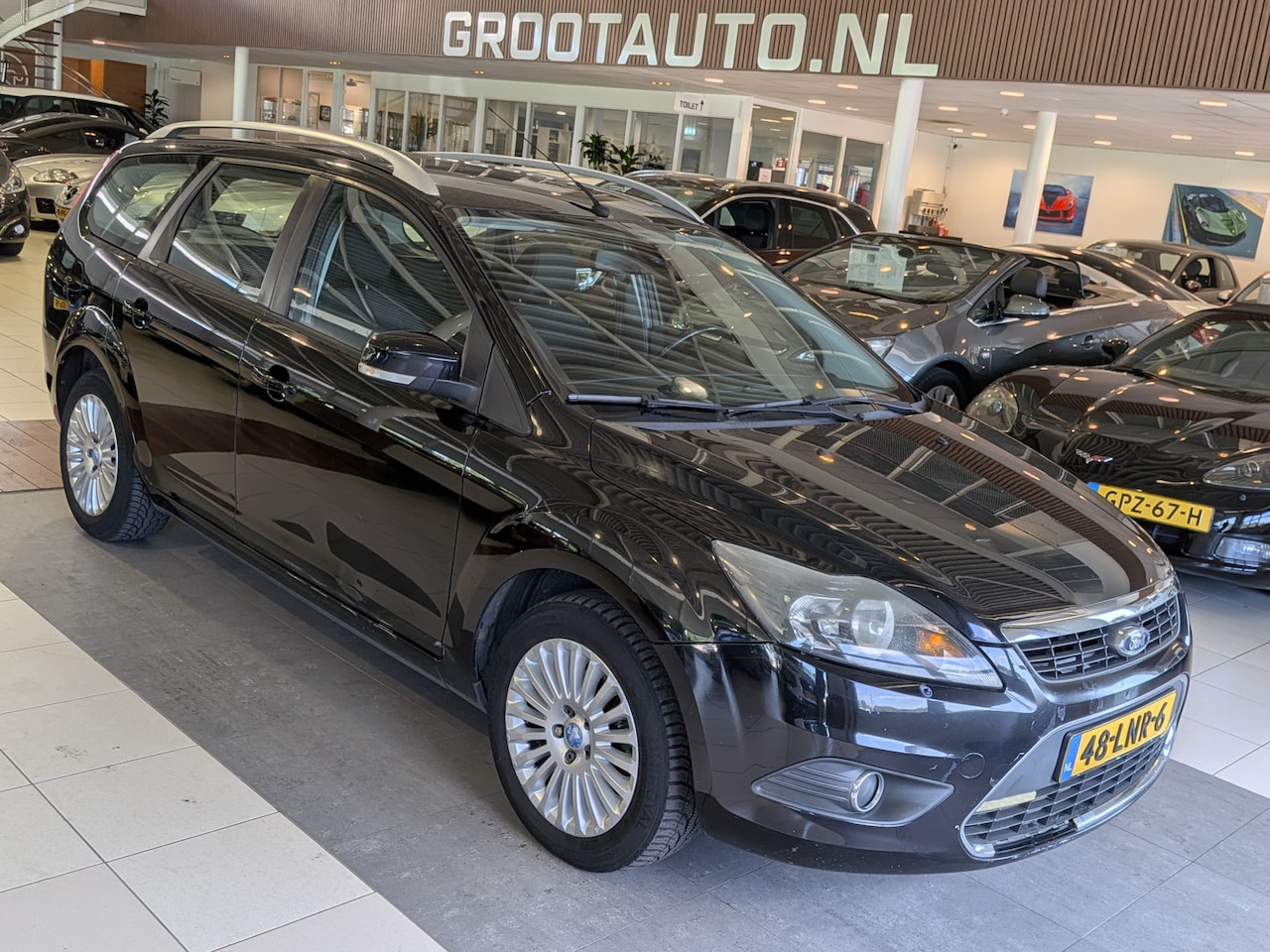 Ford Focus Wagon - 1.8 Limited Flexi Fuel Airco, Cruise Control, Keyless Start, Stuurbekrachtiging - AutoWereld.nl