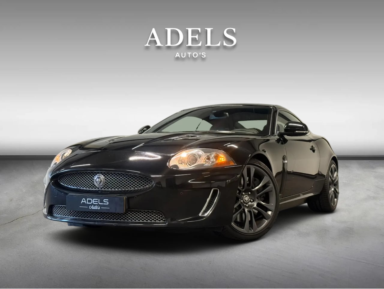 Jaguar XKR - 5.0 V8 S/C 510PK Coupé Bower&Wilkins - AutoWereld.nl