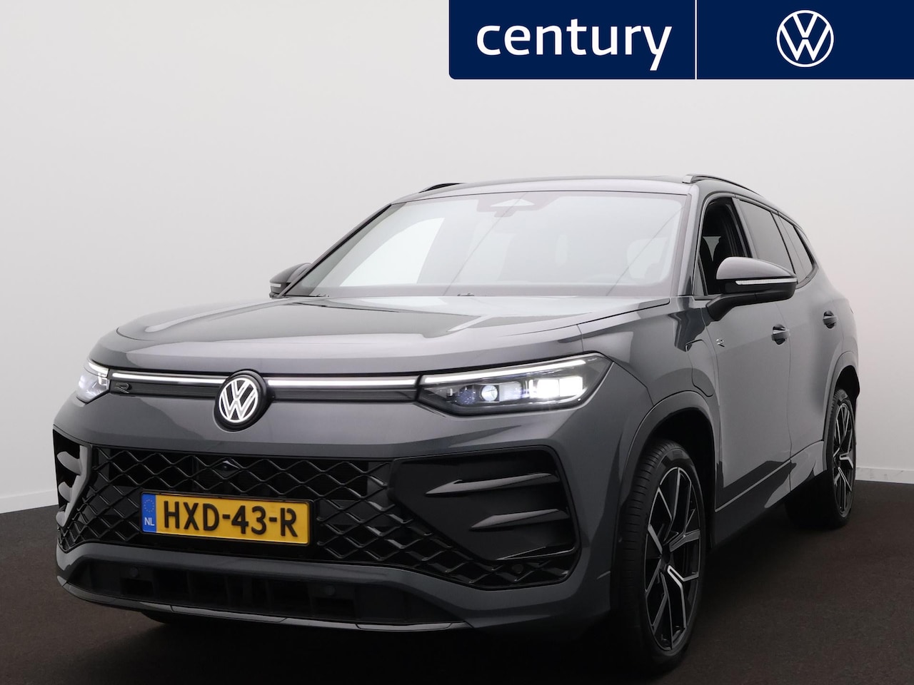 Volkswagen Tayron - 1.5 eHybrid R-Line Edition | Panodak | 360 Camera | Zwenkbare trekhaak | Massagestoelen | - AutoWereld.nl