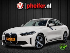 BMW i4 - eDrive40 84 kWh SOH 99% Camera/ Navigatie/ Harman-Kardon/ Dab/ Sportstoelen/ Elektr. achte