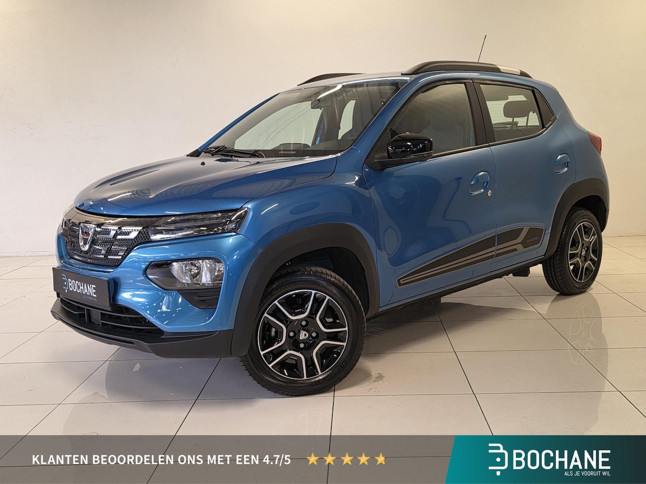 Dacia Spring - Comfort Plus (Black Pack) 27 kWh | SoH 92% | Navigatie | Camera | Carplay | - AutoWereld.nl