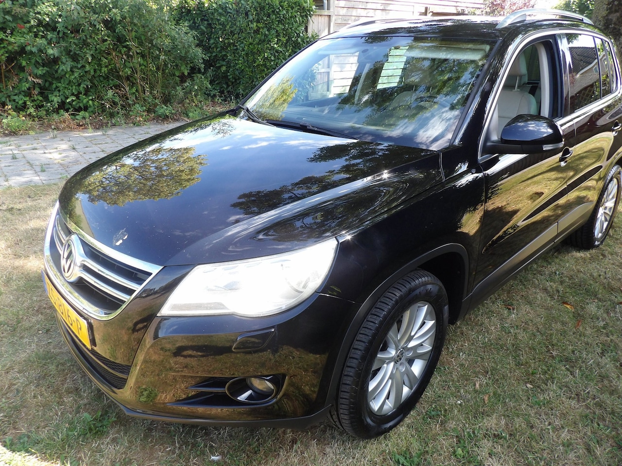 Volkswagen Tiguan - 1.4 TSI Trend&Fun 4Motion airco navi - AutoWereld.nl