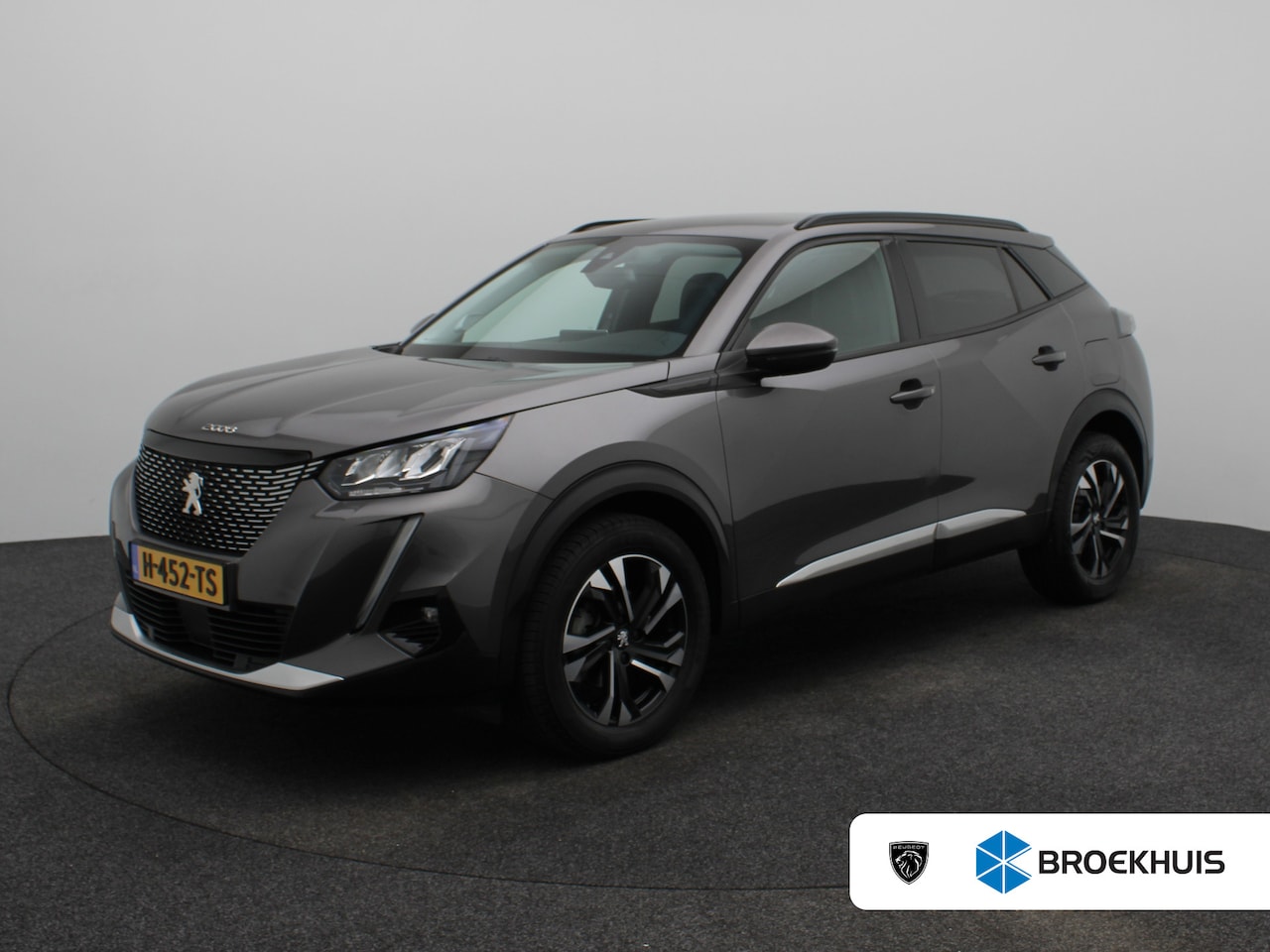 Peugeot 2008 - 1.2 PureTech Allure | Achteruitrijcamera | Dodehoekdetectie | Navigatie | Keyless entry - AutoWereld.nl
