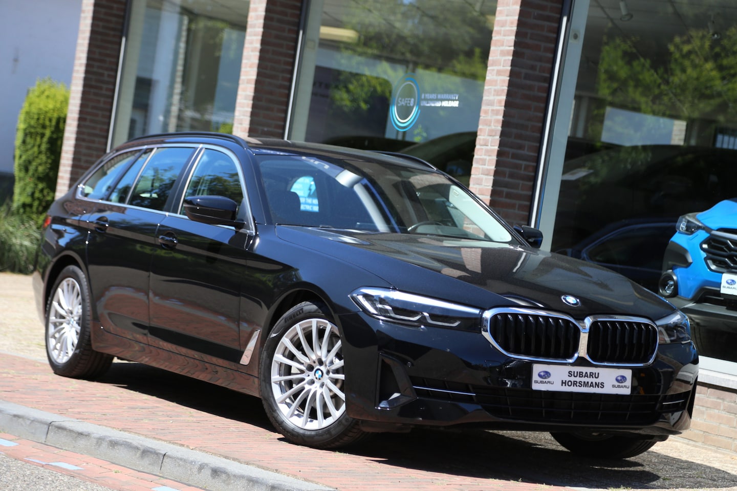 BMW 5-serie Touring - 530e Executive Leer HuD Navi Camera LED - AutoWereld.nl