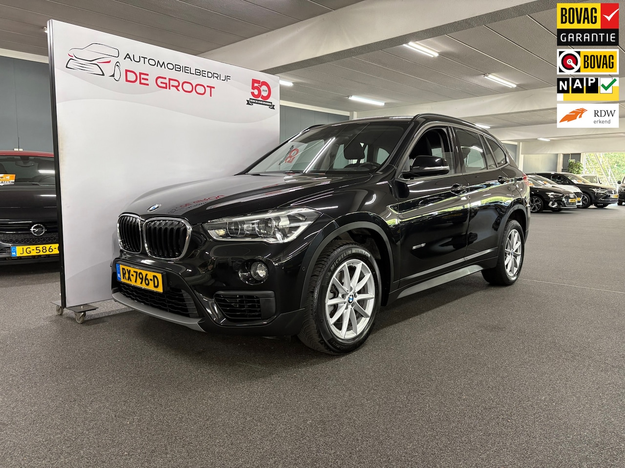 BMW X1 - SDrive18i Executive/ NL auto/ Automaat/ Parkeersensoren - AutoWereld.nl