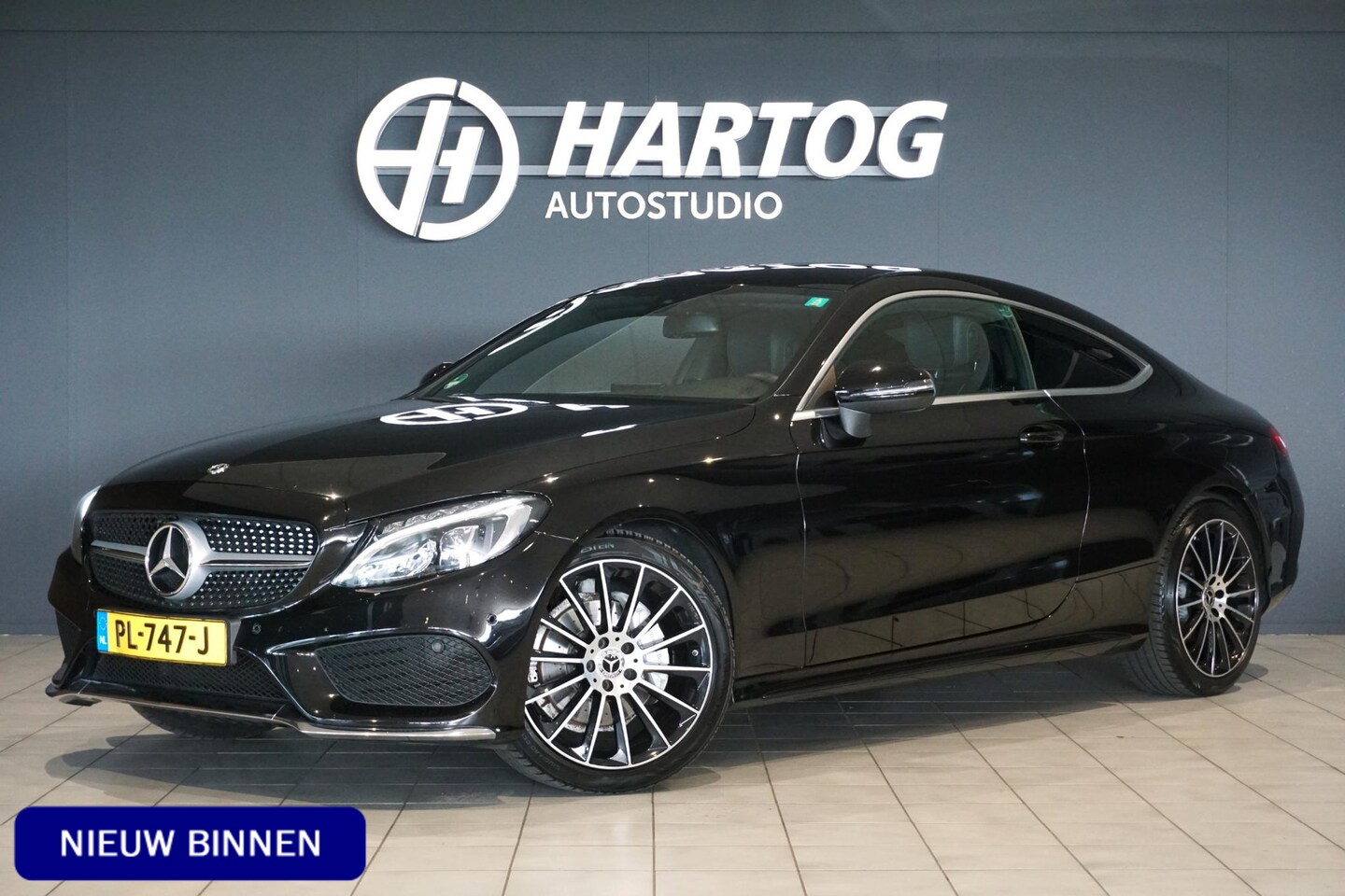 Mercedes-Benz C-klasse Coupé - 180 Ambition AMG + SPORTSTOELEN / 19'' / STOELVERWARMING / XENON - AutoWereld.nl