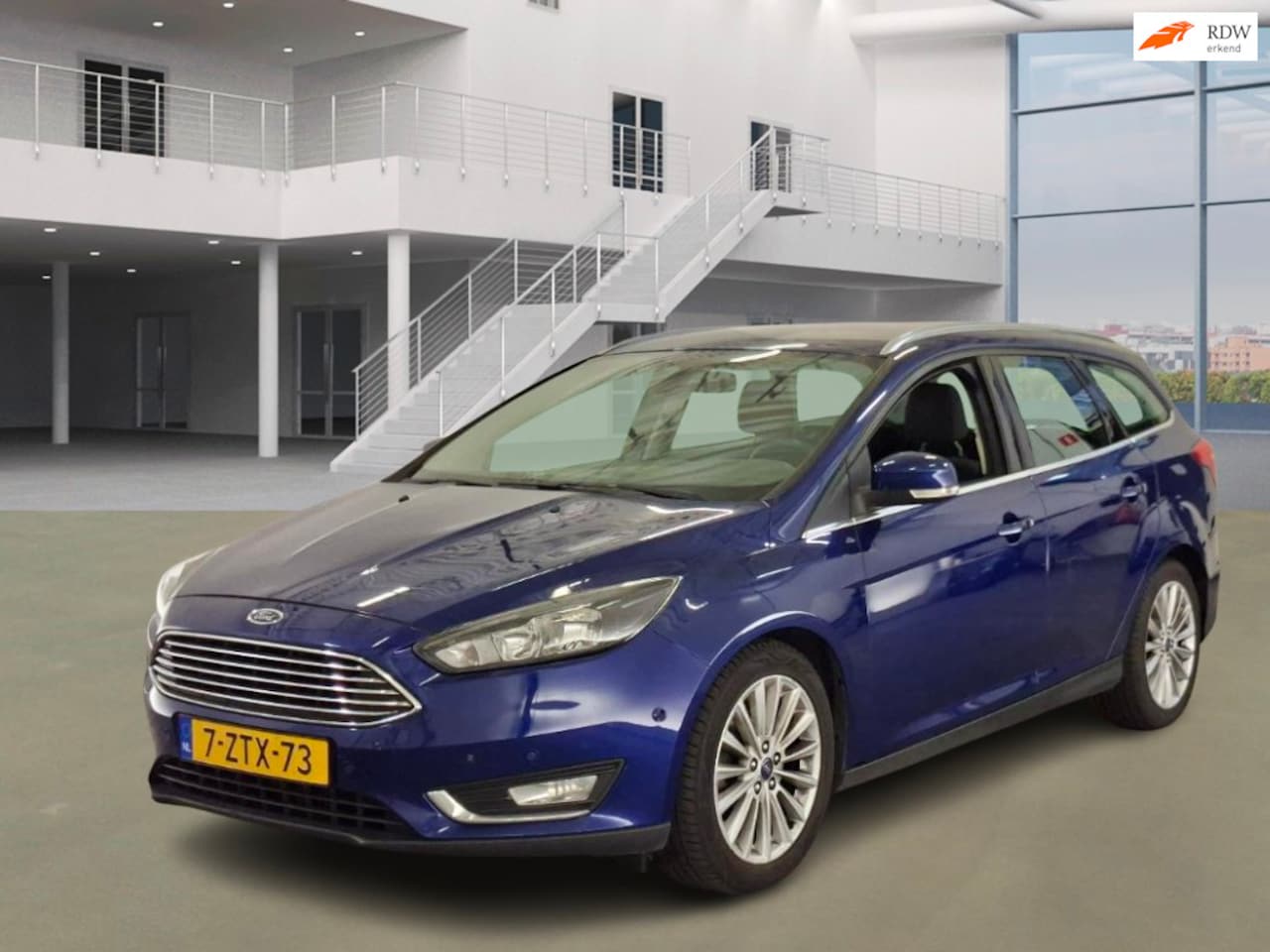 Ford Focus Wagon - 1.0 First Edition PSENSOR NAVI CRUISE 2 X SLEUTELS - AutoWereld.nl