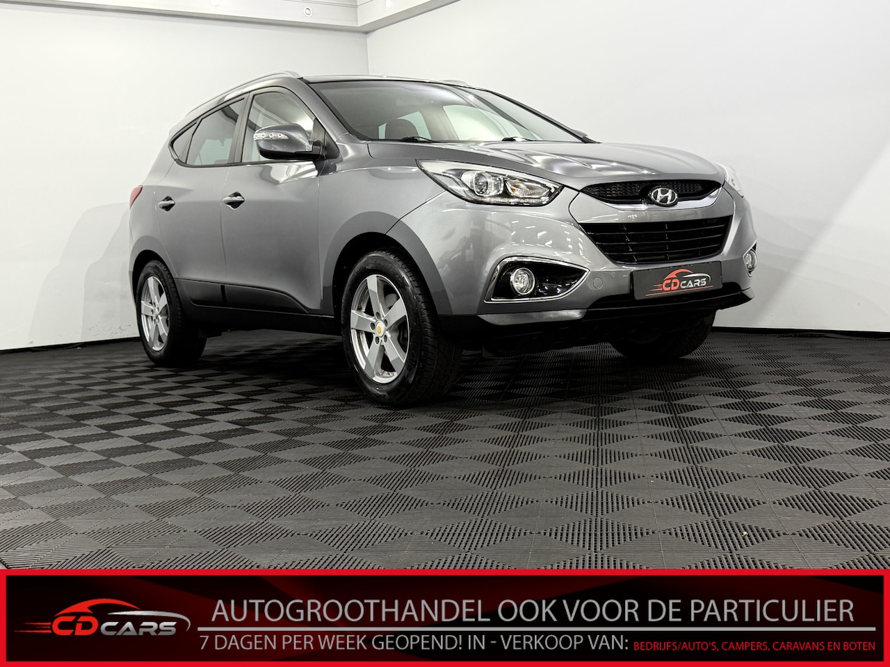 Hyundai ix35 - 2.0i Business Edition Camera, Navi, Cruise control, Stoelverwarming, Clima, Half leder, Li - AutoWereld.nl