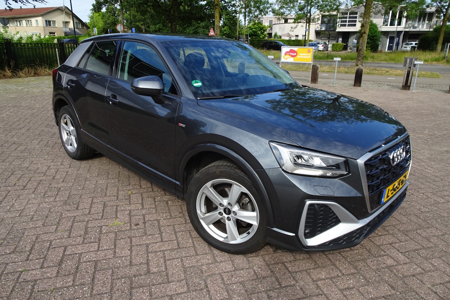 Audi Q2 - 35 TFSI S edition 1.5 TFSI 150 pk AUTOMAAT * AIRCO * LMV * NAVI * CRUISE CONTROL * TREKHAAK * - AutoWereld.nl