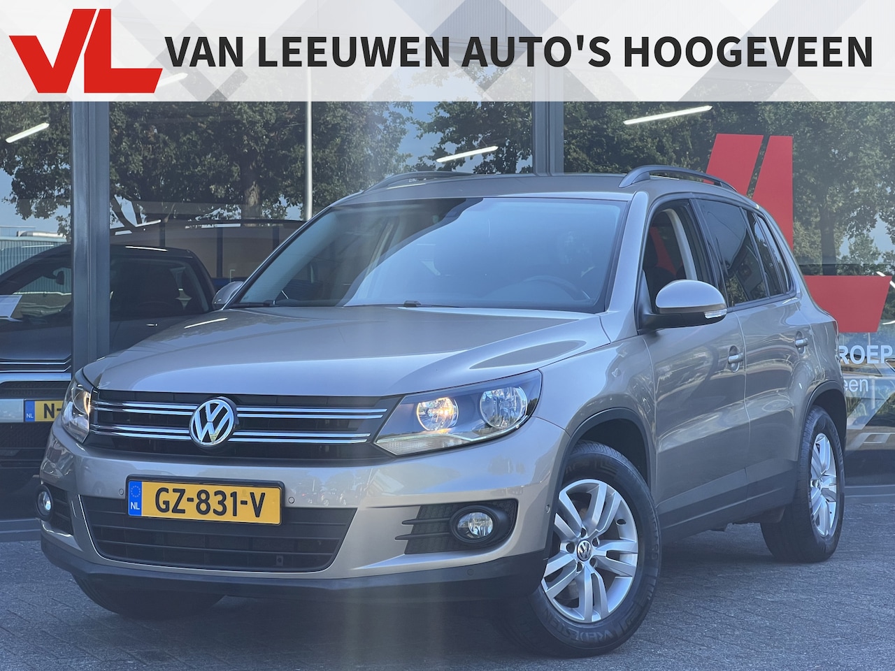 Volkswagen Tiguan - 1.4 TSI Sport&Style | Trekhaak | Navi | Camera - AutoWereld.nl