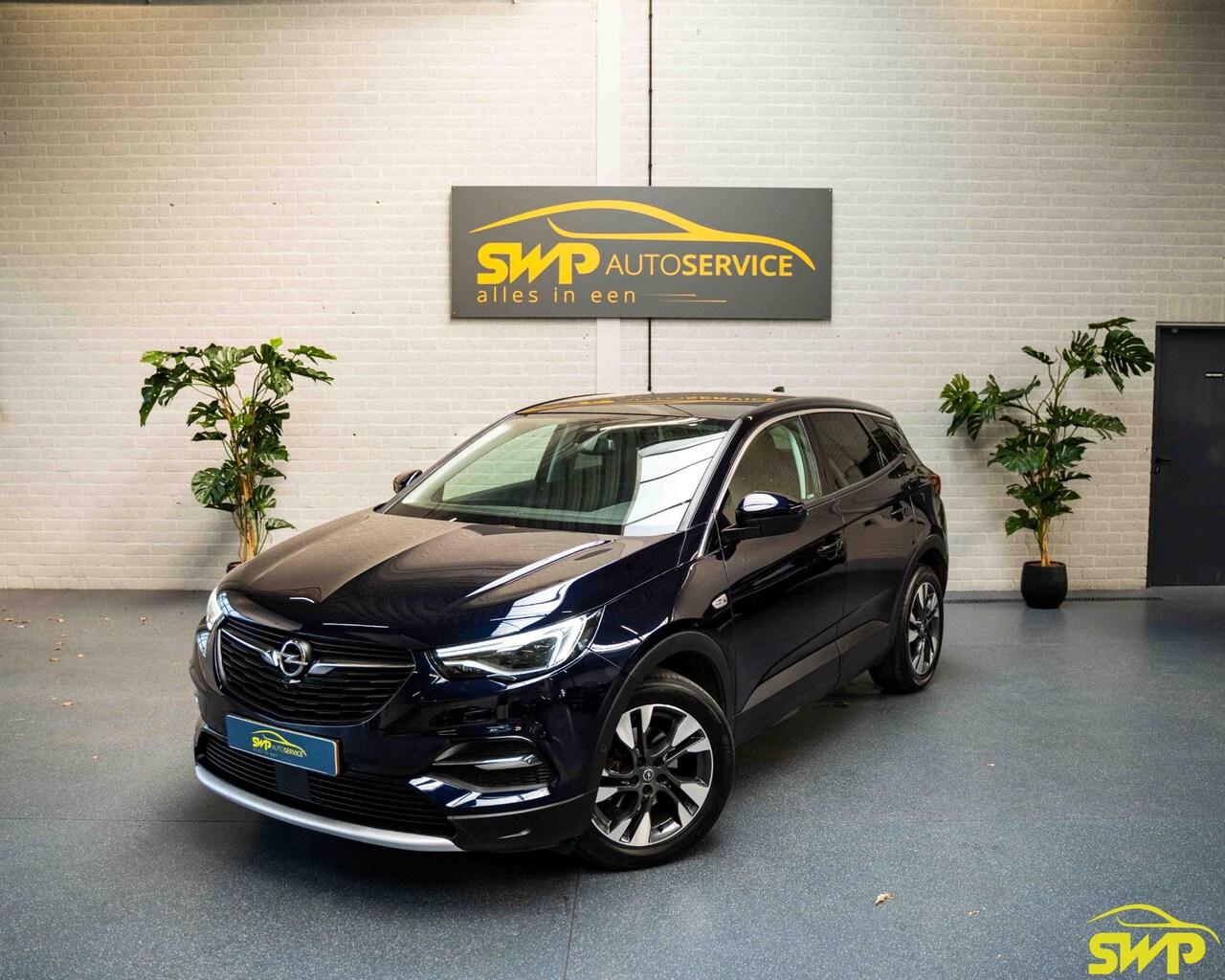 Opel Grandland X - 1.2 Turbo Business Executive | Leer | Pano | Stoelventilatie | Navi | Cam | Trekhaak | Stu - AutoWereld.nl