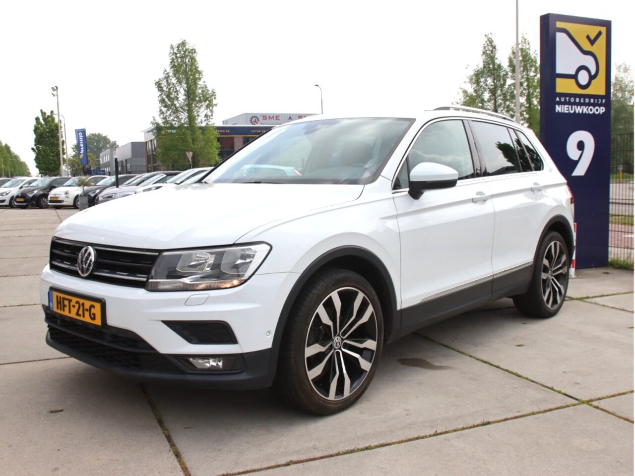 Volkswagen Tiguan - 1.4 TSI 150pk Business DSG, Carplay/Camera, winter pakket, trekhaak Zomeractie! - AutoWereld.nl