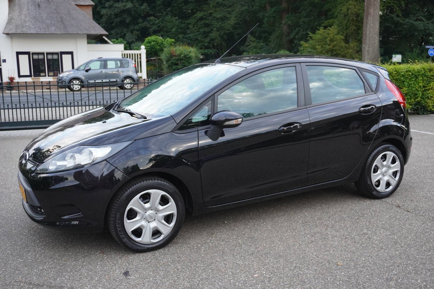 Ford Fiesta - 1.25 Titanium 5 Drs Airco - AutoWereld.nl