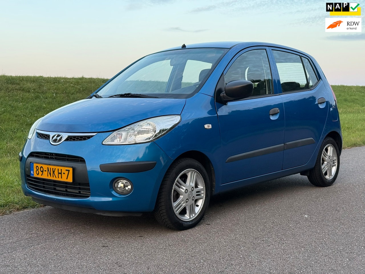 Hyundai i10 - 1.1 Active Orange | Airco | PDC | NWE APK | NAP - AutoWereld.nl