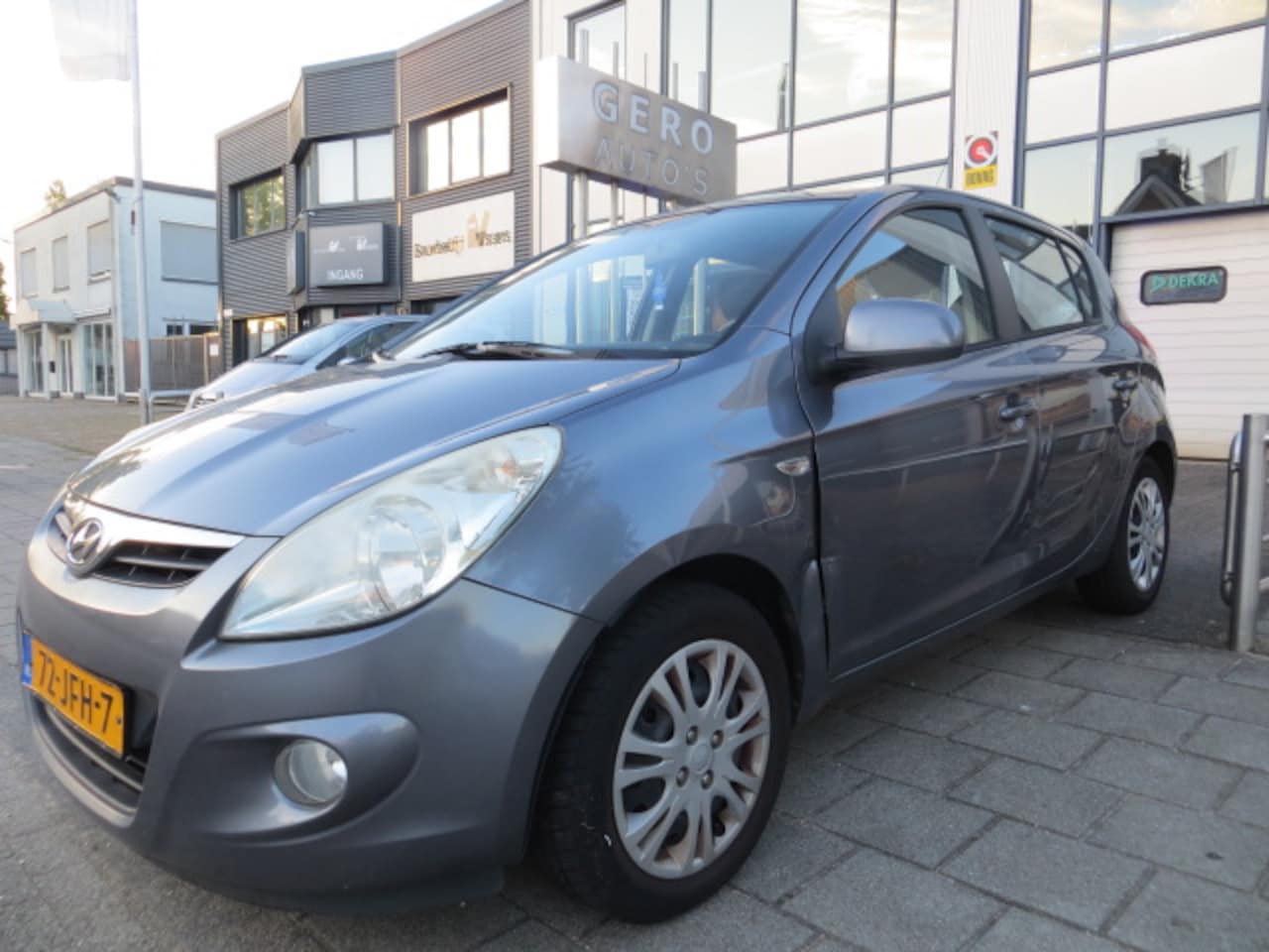 Hyundai i20 - 1.4i DynamicVersion airco 5drs lichte schade portier - AutoWereld.nl