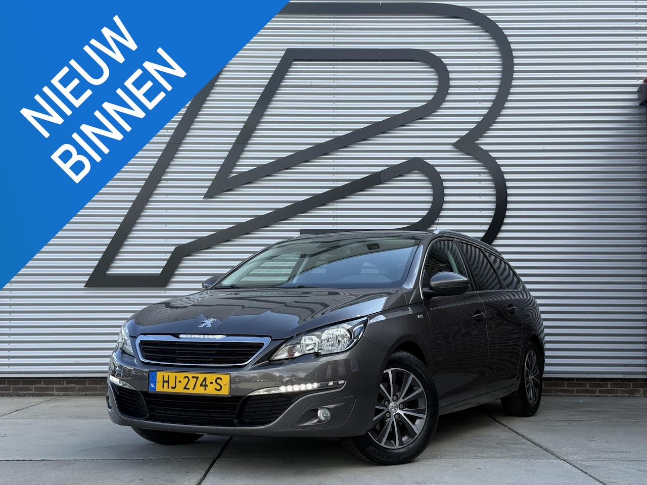 Peugeot 308 SW - 1.2 PureTech Style 2e Eigenaar|Navi|Trekhaak|Cruise|PDC V+A|Clima|Elek ramen|D-riem vv in - AutoWereld.nl