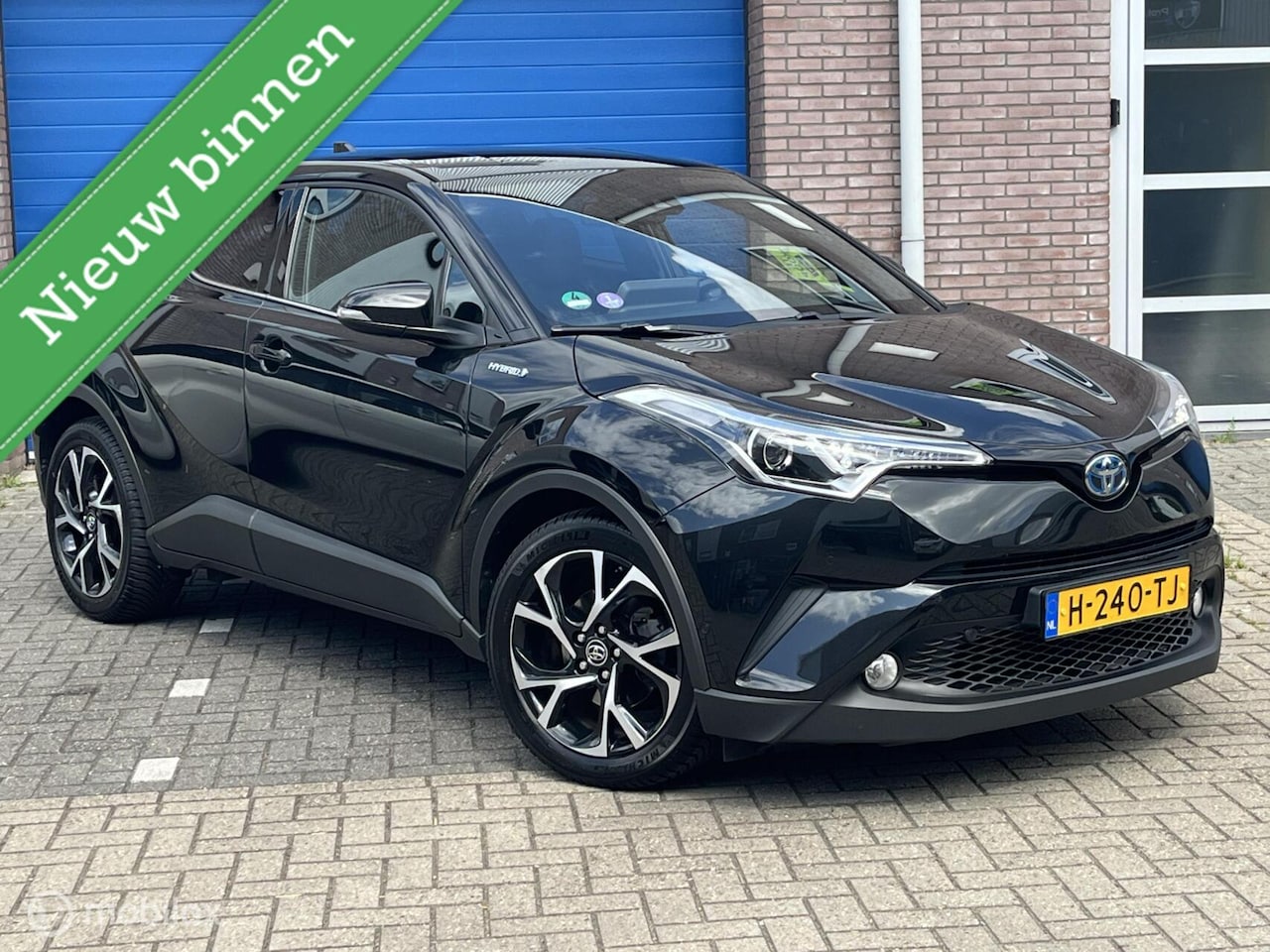 Toyota C-HR - 1.8 Hybrid Executive Ultimate Bouwjaar 2019, LED, Camera, Navi, 100% Dealer onderhouden! - AutoWereld.nl