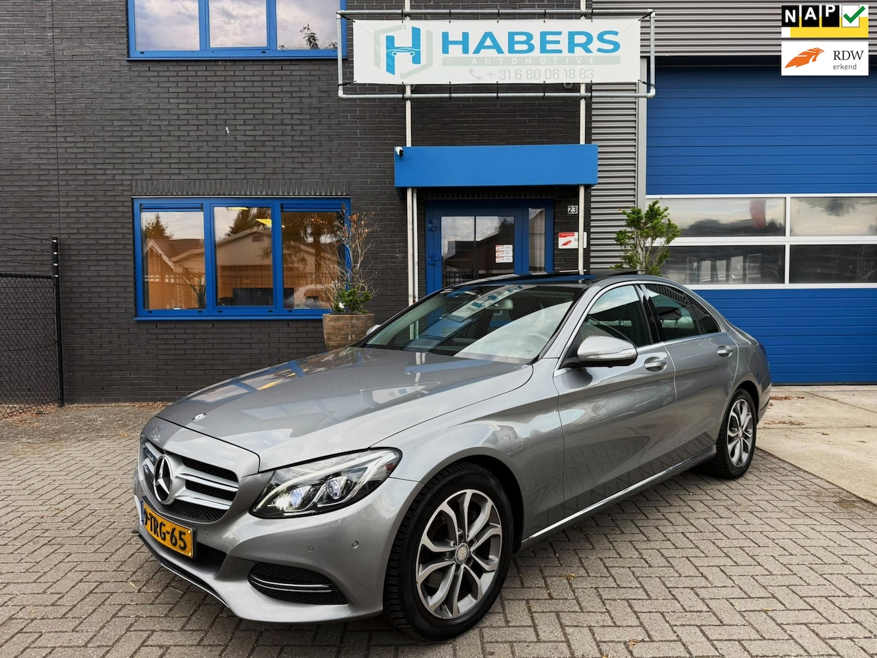 Mercedes-Benz C-klasse - 200 Prestige 184PK|Groot Navi|AUT|Sportstoelen|Leder|Kantel/Schuifdak|Full Led|NL Auto|Sto - AutoWereld.nl