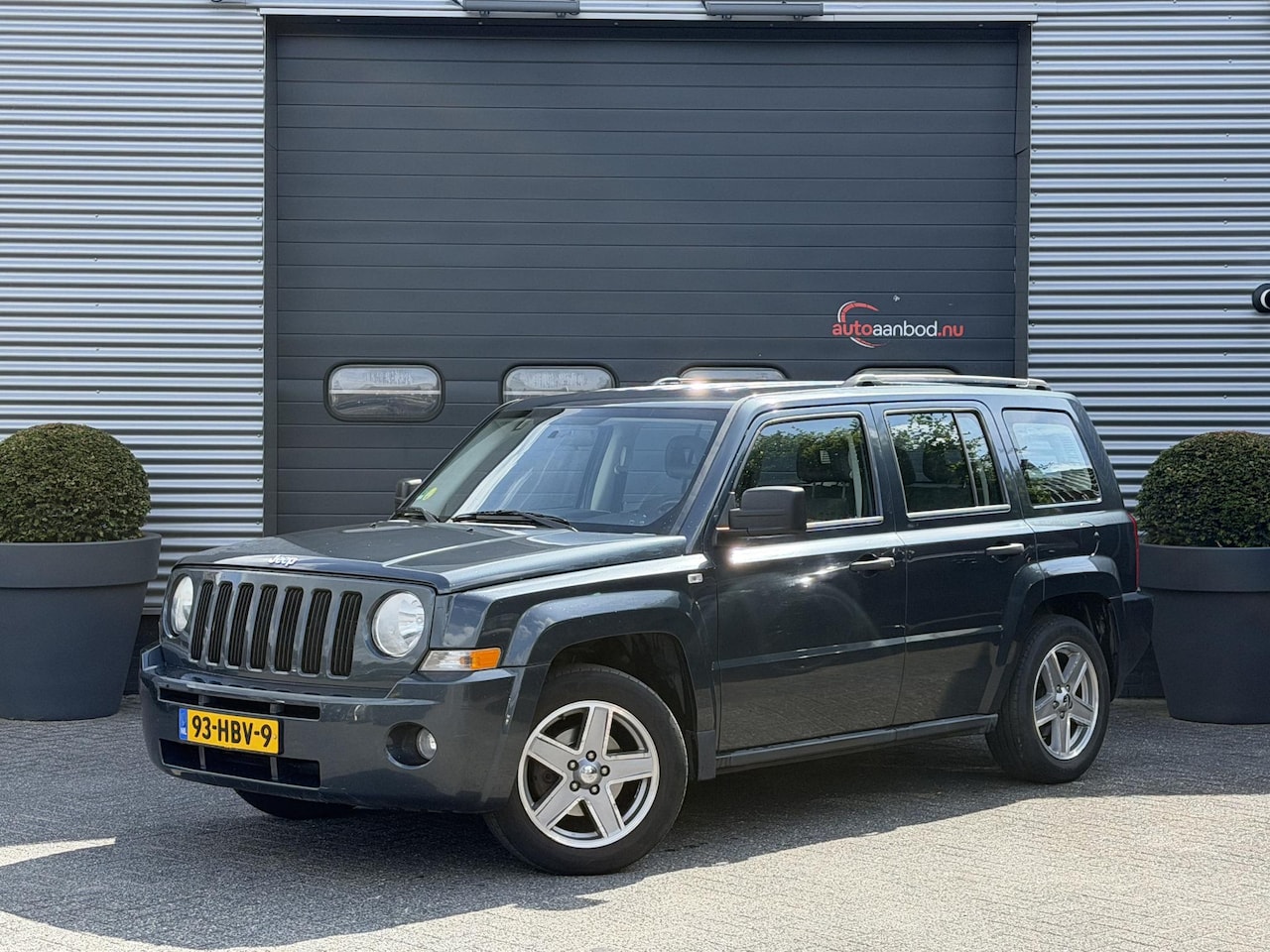 Jeep Patriot - 2.4 Sport Adventure | Airco | Elektrische Ramen | Trekhaak | Lichtmetalen Velgen | - AutoWereld.nl
