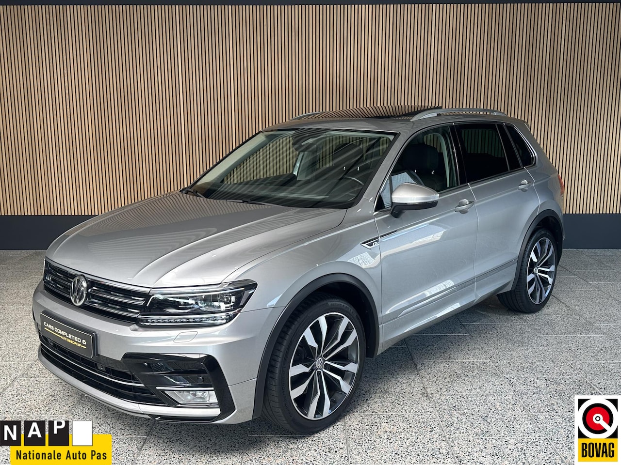 Volkswagen Tiguan - 2.0 TSI 4Motion Highline NL auto | Lederen bekleding | Schuif/kantel dak - AutoWereld.nl