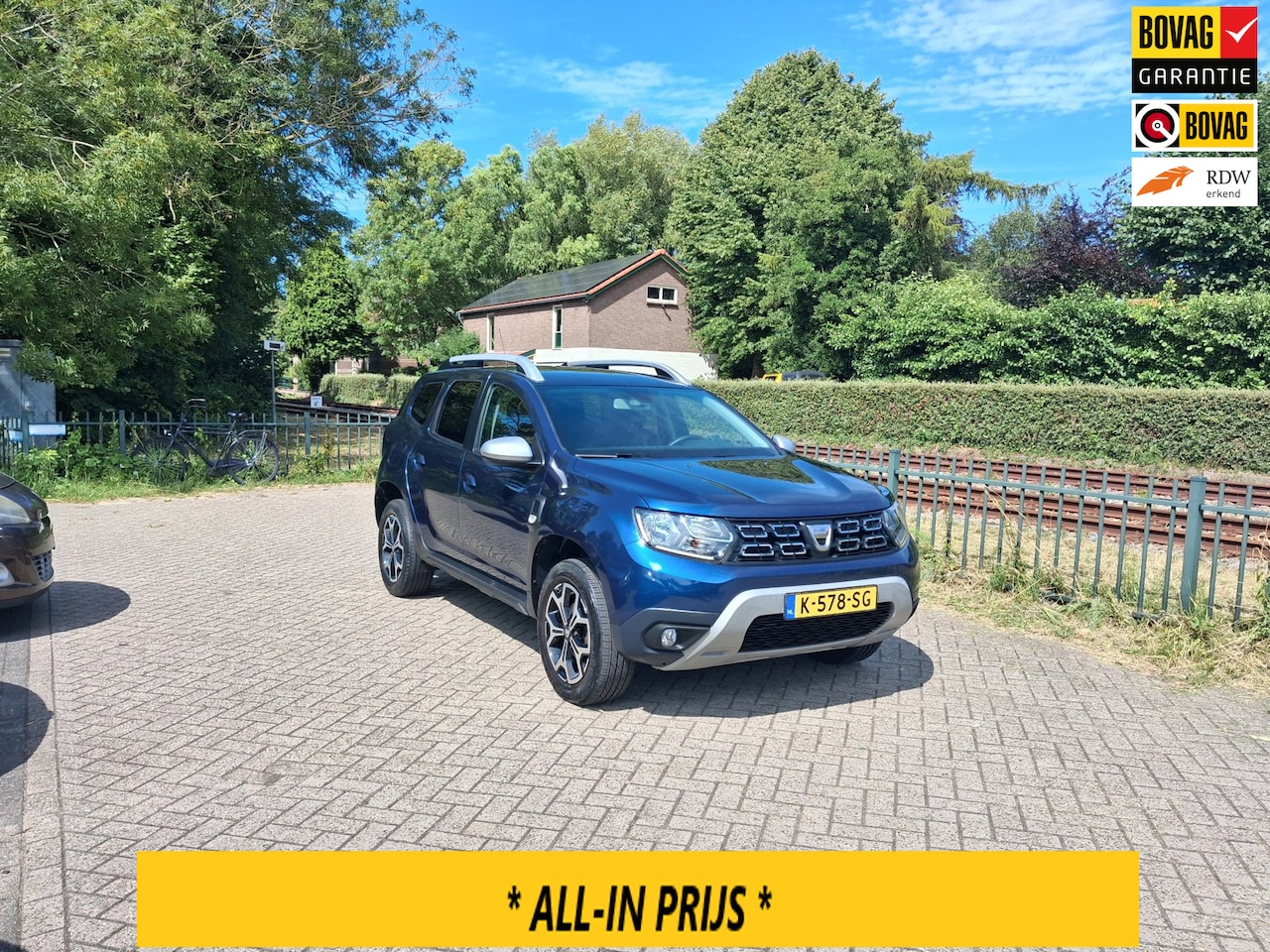 Dacia Duster - 1.2 TCe Prestige luxe navi pdc trekhaak ALLINPRIJS - AutoWereld.nl