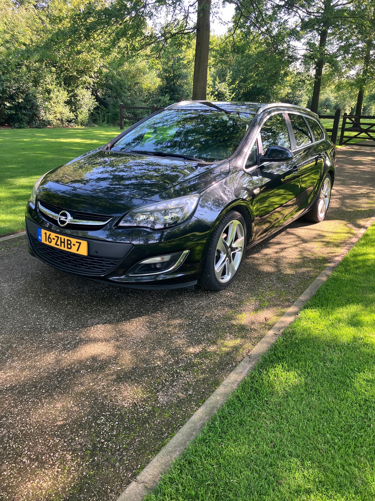 Opel Astra Sports Tourer - 1.4 Turbo Cosmo Vol Leder - AutoWereld.nl