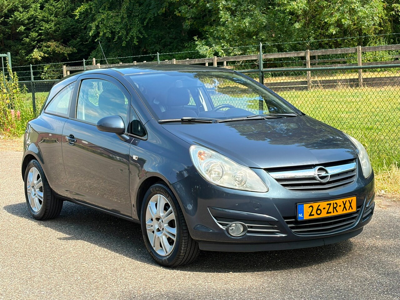 Opel Corsa - 1.2-16V Cosmo /Airco/ - AutoWereld.nl
