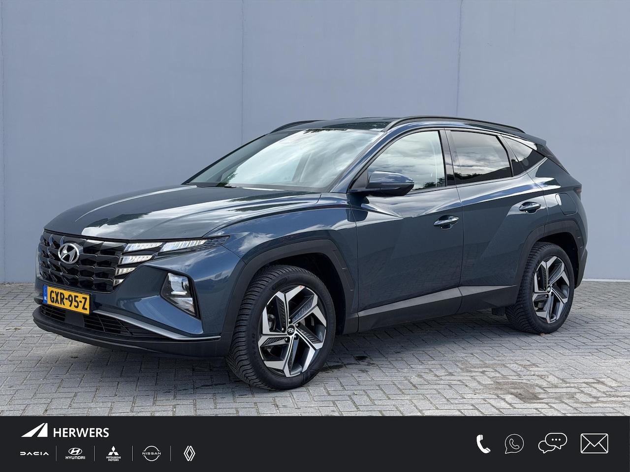 Hyundai Tucson - 1.6 T-GDI PHEV Comfort Smart 4WD / Dealer Onderhouden / Fabrieksgarantie tot 9-2028 / Navi - AutoWereld.nl